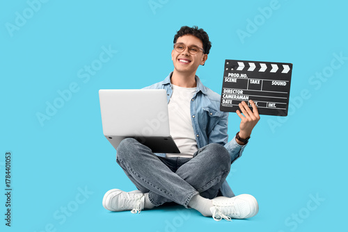 Male screenwriter with lapt...