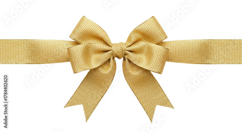 A golden satin ribbon bow on black background