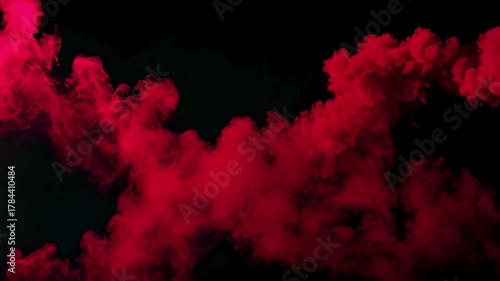 Red smoke background Swirling dense red smoke over dark black background with dramatic contrast and curling tendrils, evoking mystery and hidden energy. Concept of danger, power, and dramatic