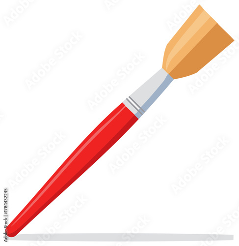 Red paint brush with tan bristles used for artistic painting and creative design projects, representing art supplies