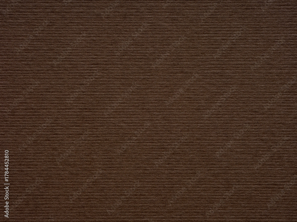 Fototapeta premium The warm, rich brown texture of this paper exudes an earthy, grounded presence with its organic feel