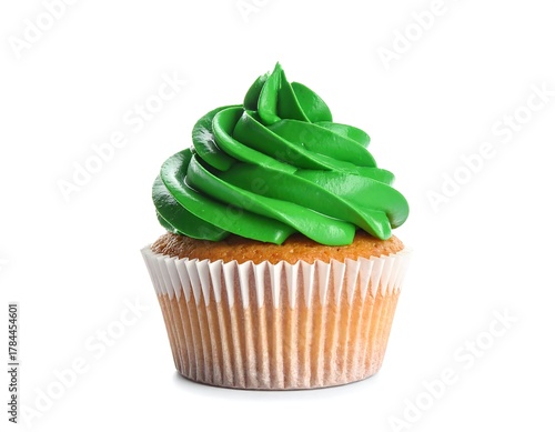 A single cupcake with a light-brown baked base and tall swirls of bright green frosting atop, isolated on white