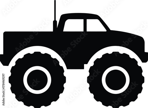 Black silhouette of a monster truck with large tires and antenna