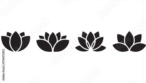 Minimalist lotus flower silhouettes representing purity and balance in black on white background