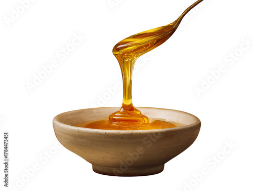 Agave nectar stream pouring into a small ceramic bowl with amber glow