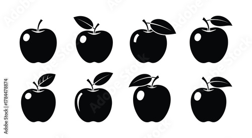 Simple black and white illustration of several apples in various positions