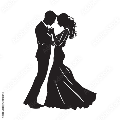 Romantic silhouette of a bride and groom embracing tenderly on their wedding day in a classic elegant pose silhouette