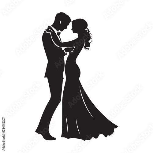Romantic silhouette of a bride and groom embracing tenderly on their wedding day in a classic elegant pose silhouette