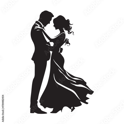 Romantic silhouette of a bride and groom embracing tenderly on their wedding day in a classic elegant pose silhouette