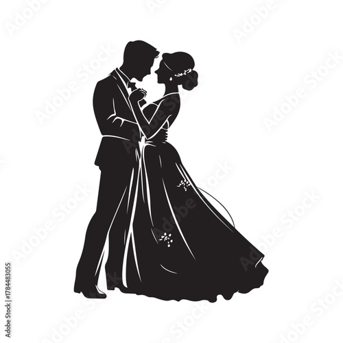 Romantic silhouette of a bride and groom embracing tenderly on their wedding day in a classic elegant pose silhouette