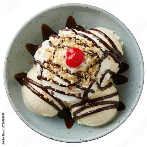 Delicious ice cream sundae with chocolate syrup, whipped cream, and nut. An indulgent and sweet frozen dessert