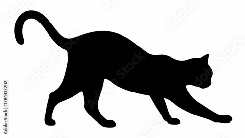 Silhouette of a cat stretching with its tail up and its body arched in a playful or predatory posture