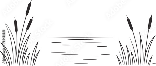 Cattails beside rippling water reeds grass