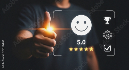 Customer Experience and Service Rating Concept with a Thumbs Up Sign and 5.0 Five Star Satisfaction Review on a Digital Interface Screen