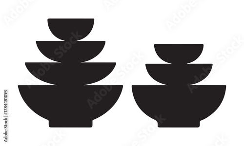 Two stacks of black silhouette bowls dinnerware