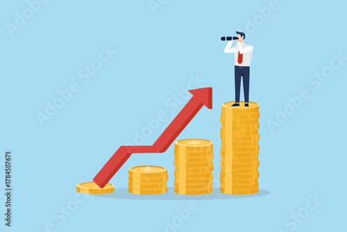 Businessman with spyglass on stack of coins looking at upward trending red arrow representing financial growth