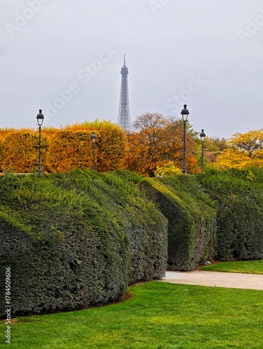 Autumn in Paris Eiffel Tower Rising Above Vibrant Fall Foliage, Colorful Trees, Romantic Travel Destination