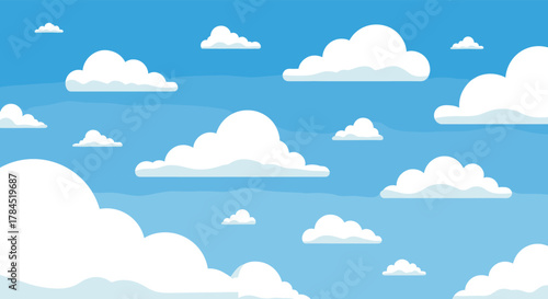 A vibrant blue sky filled with numerous soft, white, cartoon-style clouds, creating a serene and expansive aerial background with subtle atmospheric layers.