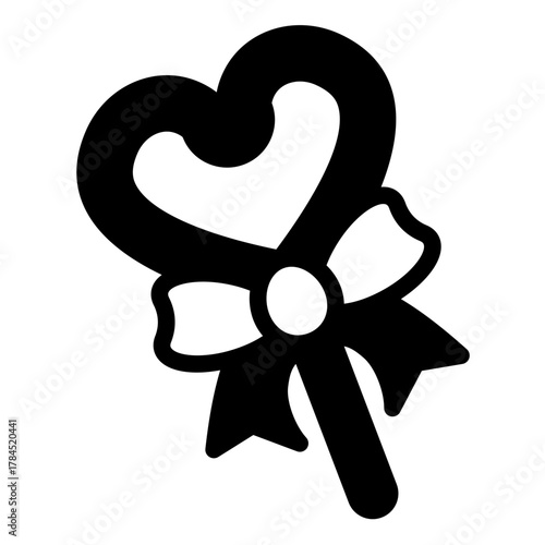 Candy solid icon, desert sweets concept. Vector graphics. Heart shaped candy and bow sign on white background, style icon mobile or web design.