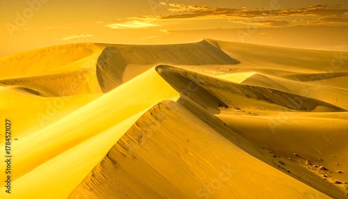 Fototapeta Naklejka Na Ścianę i Meble -  Golden Sand Dunes - A Serene Desert Landscape at Sunset.