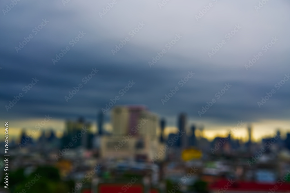 Fototapeta premium BLUE BUIDING AND SKY of clouds over the city at night IN BANGKOK THAILAND, PICTURE FOR MOTION BLUE CITYSCAPES 