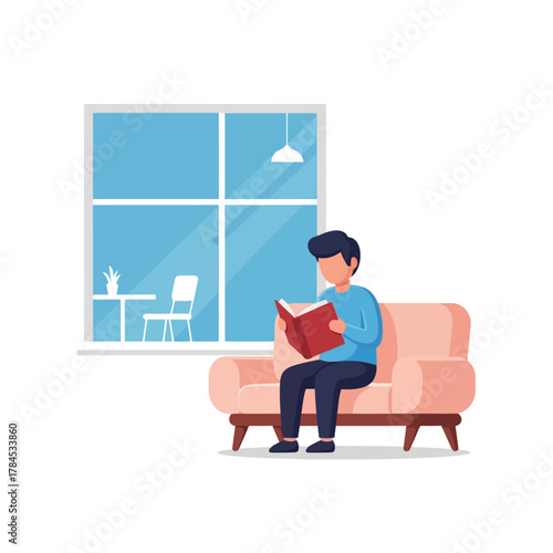 Peaceful man relaxing in a comfy chair while reading a book indoors