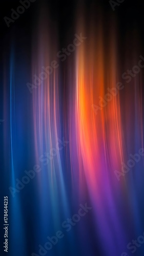 Abstract background of flowing vertical lines of blue orange and purple light image
