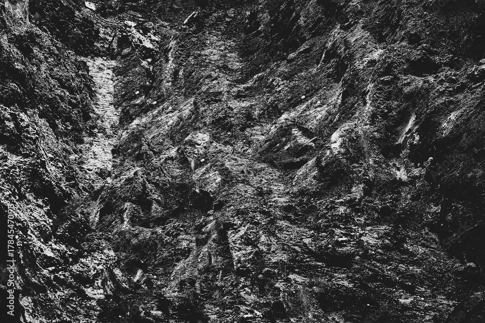 Obraz premium Black white ground.Abstract soil pit background