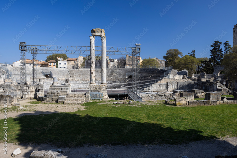 Naklejka premium Roman Theatre ruins with seating in Arles, France