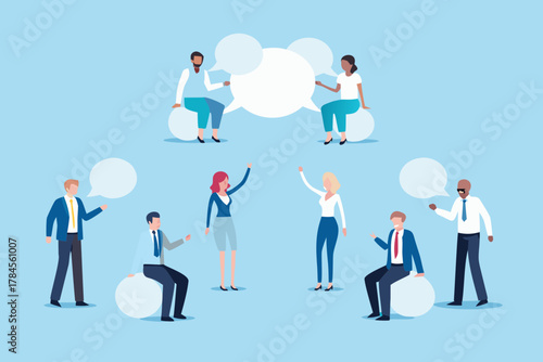 Diverse group of people in business attire communicating with speech bubbles in a collaborative meeting