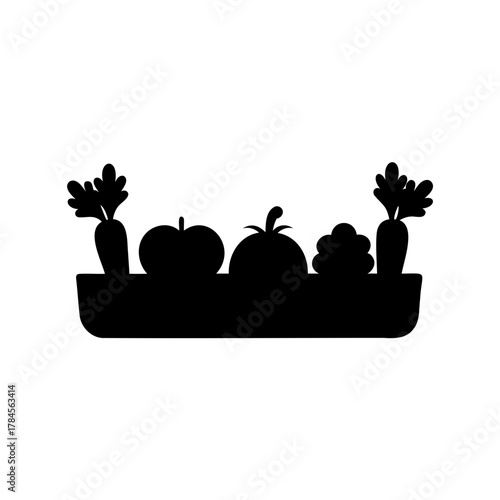Silhouette of a harvest basket filled with autumn vegetables and fruits