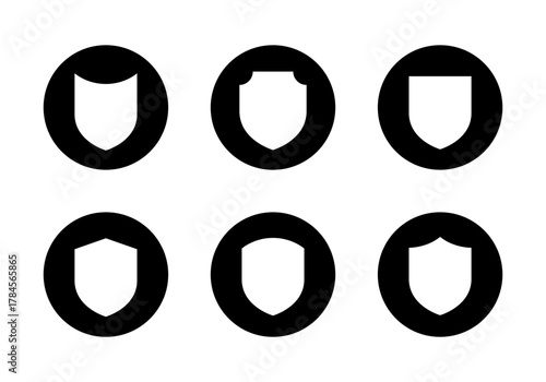 Protection shield icon set in black circle. Security, guard, and safety symbol