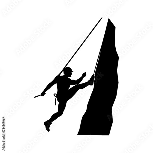 silhouette of a climber ascending