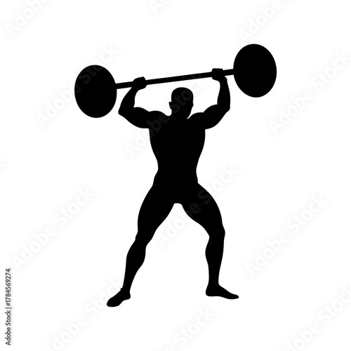 silhouette of a man lifting heavy barbell