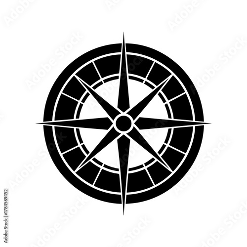 silhouette of a round compass with directional needle