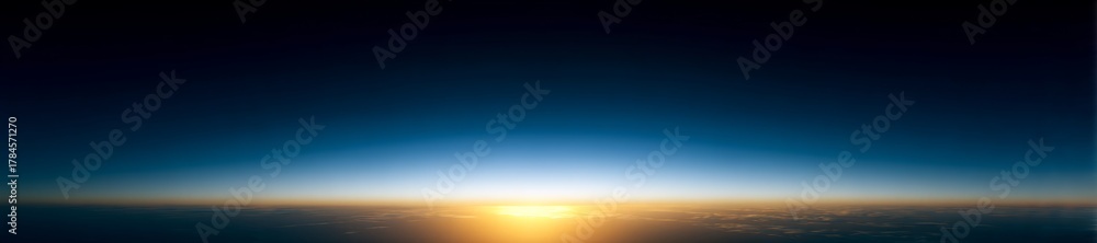 Fototapeta premium Stunning view of the sun rising above the Earth's horizon