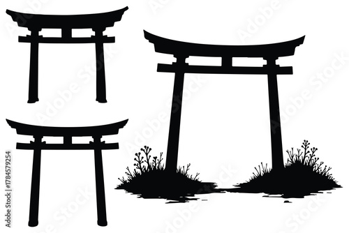 Black silhouette Japanese torii gates and grass shinto