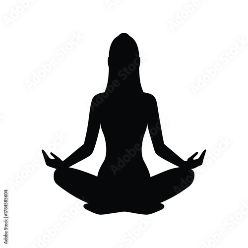 Silhouette of woman in lotus position meditating and spiritual practice