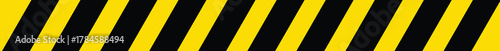 A repeating pattern of diagonal black and yellow stripes, creating a hazard or warning design. The stripes are evenly spaced and create a sense of movement.
