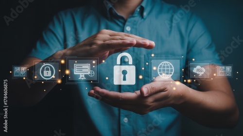 Businessman holding virtual padlock icon for data protection and network security to protect personal information access cyber security concept