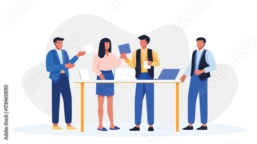 Diverse team of professionals collaborating around a table with laptops and documents in a modern office setting