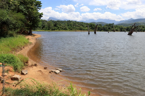 Scenic view of the natural lake with dramatic sky and mountain