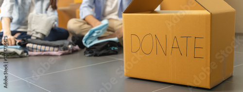 Wallpaper Mural Group of people preparing clothes in donation box preparing to give to another people Torontodigital.ca