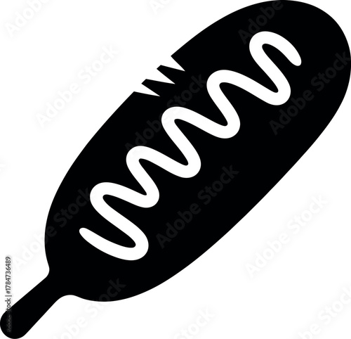 Black corn dog with white topping food snack