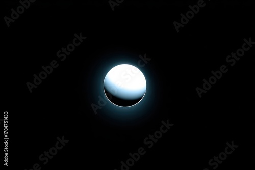Brightly Illuminated Circular Sphere on Black