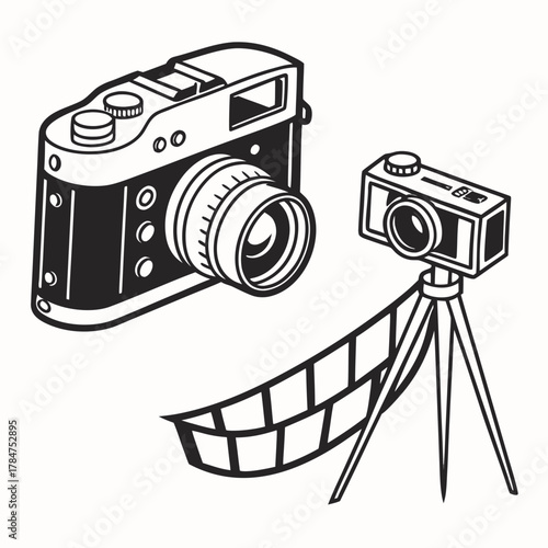 Vintage camera and modern camera on tripod with film strip