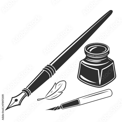 Vintage writing tools including a quill pen inkwell and fountain pen