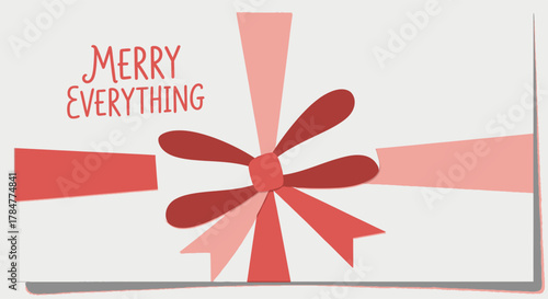 Festive gift with a bow and the words Merry Everything.
