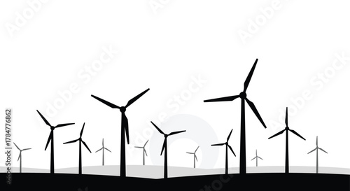 A panoramic silhouette of numerous wind turbines standing tall against a bright white sky with subtle grey circular accents