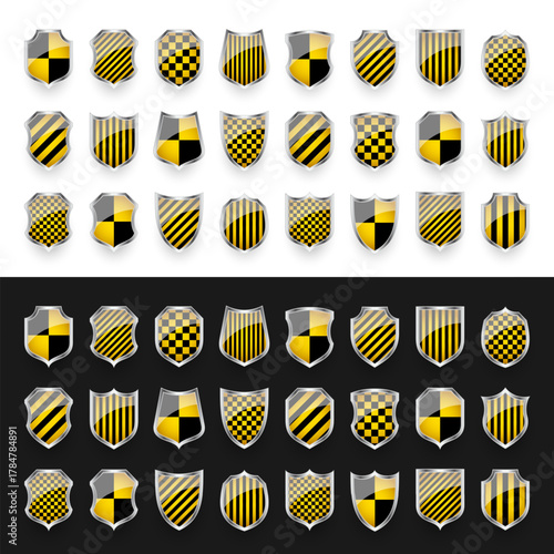 Glossy shields with yellow and black pattern. Security and protection concept. Cyber safety icons, internet privacy, web defense, digital data protection and antivirus themes. Vector illustration.